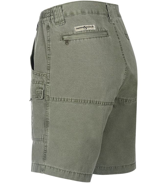 Green shorts with a brand label on a white background