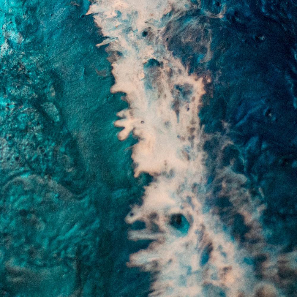 Close-up of a textured surface with blue and beige patterns