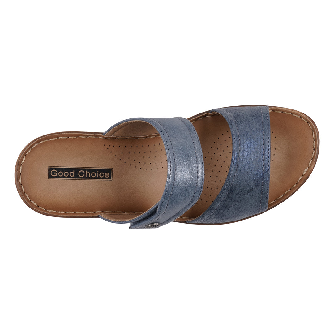 Blue sandal with brown sole on a white background