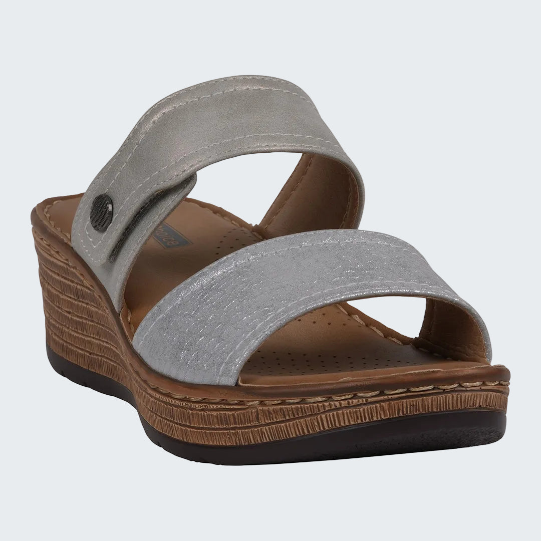 Gray sandal with a brown wedge sole on a white background