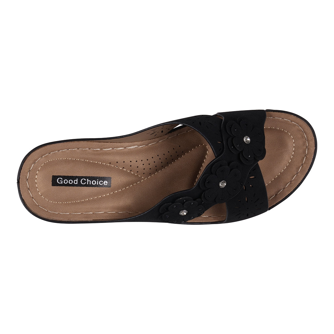 Brown sandal with black strap on a white background