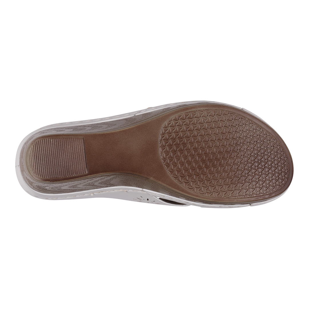 Brown sole of a shoe on a white background