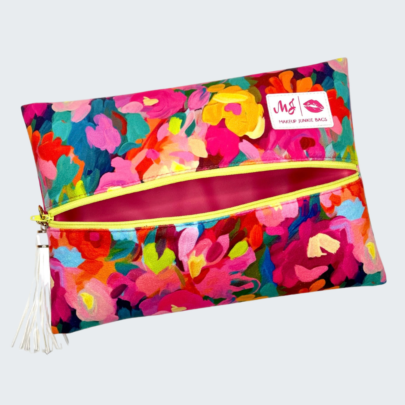 Colorful floral pouch with a visible brand logo on a white background