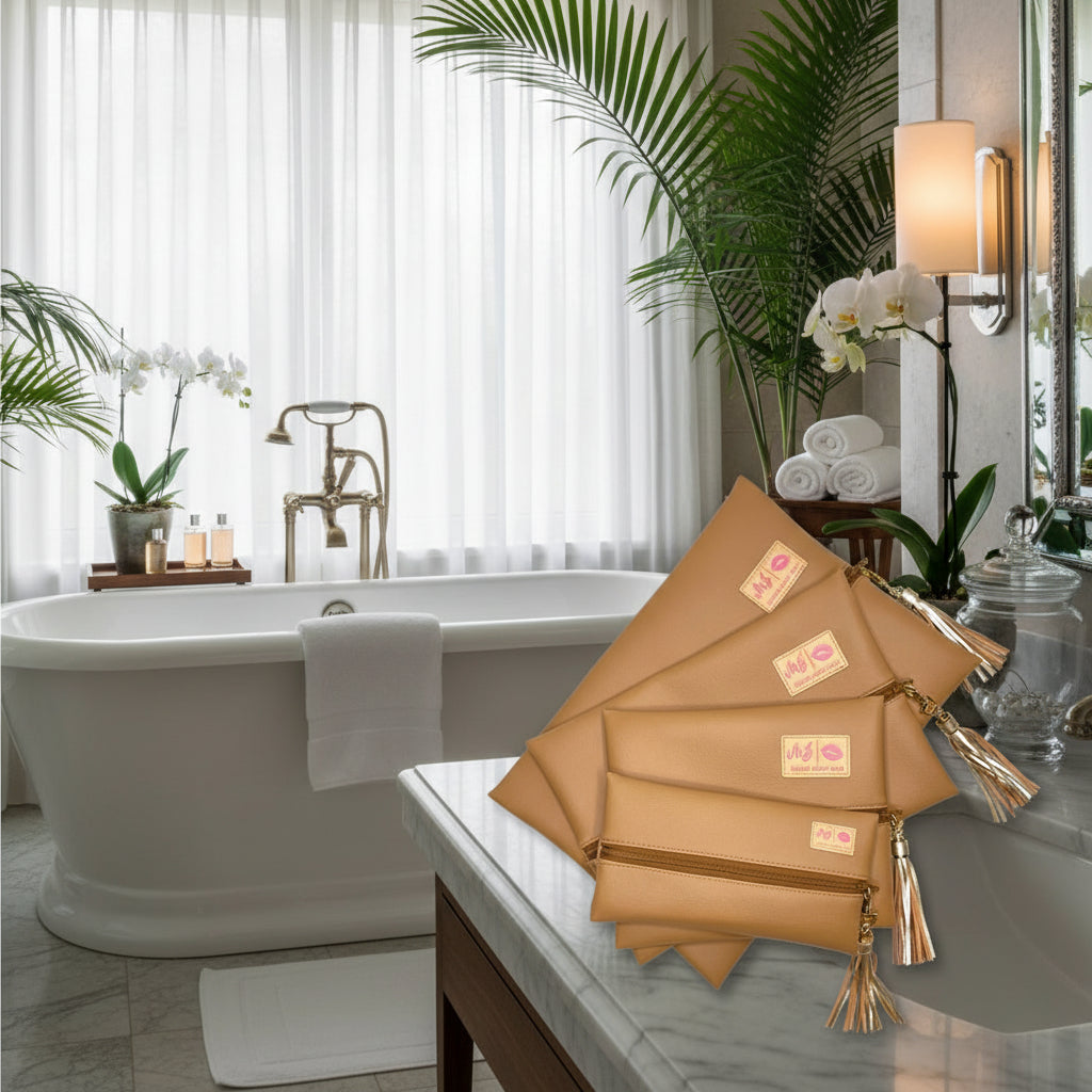 Set of brown clutch bags with tassels and visible brand logo on a white background
