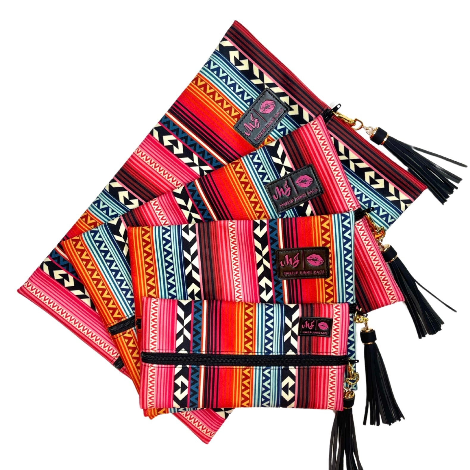 Colorful patterned pouches with tassels on a white background