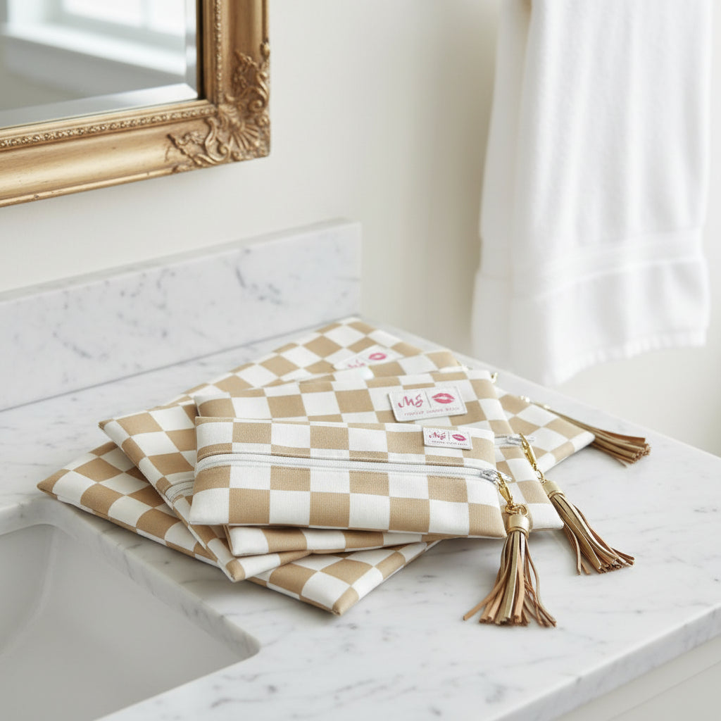 Set of checkered bags with tassels on a white background