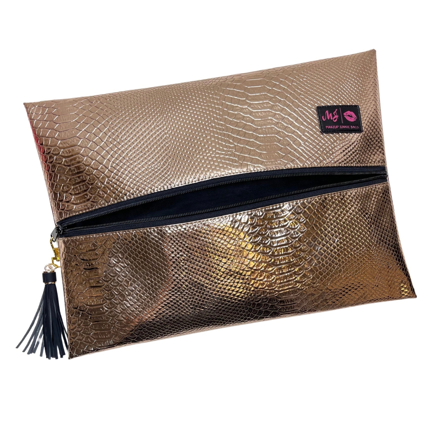 Gold clutch bag with a visible brand label on a white background