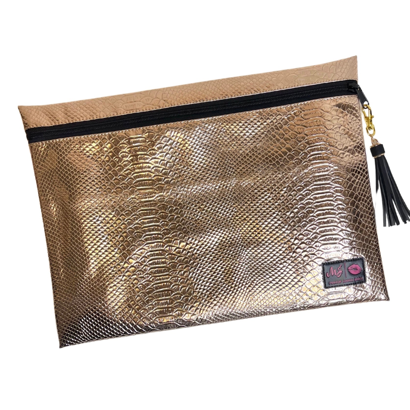 Gold metallic pouch with black zipper and tassel on a white background