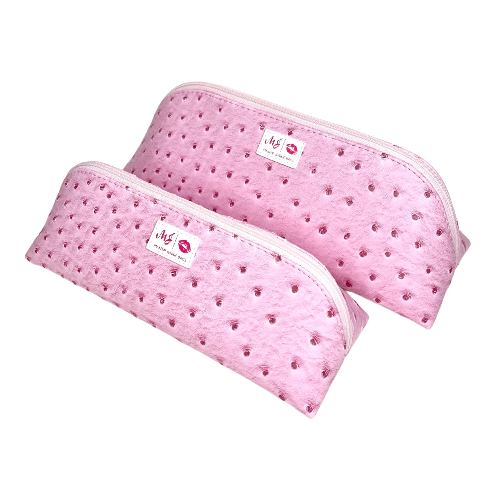 Two pink baby headbands with a brand label on a white background