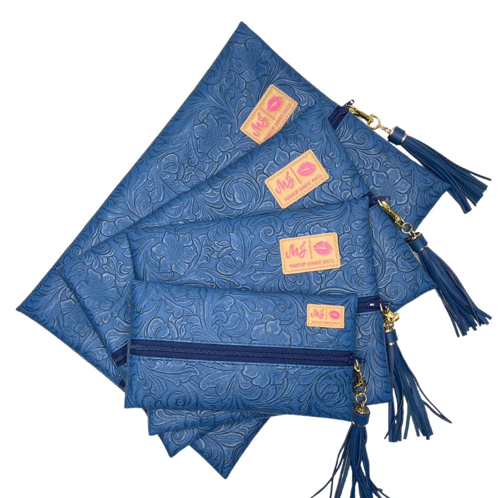 Set of blue patterned pouches with tassels and visible branding on a white background