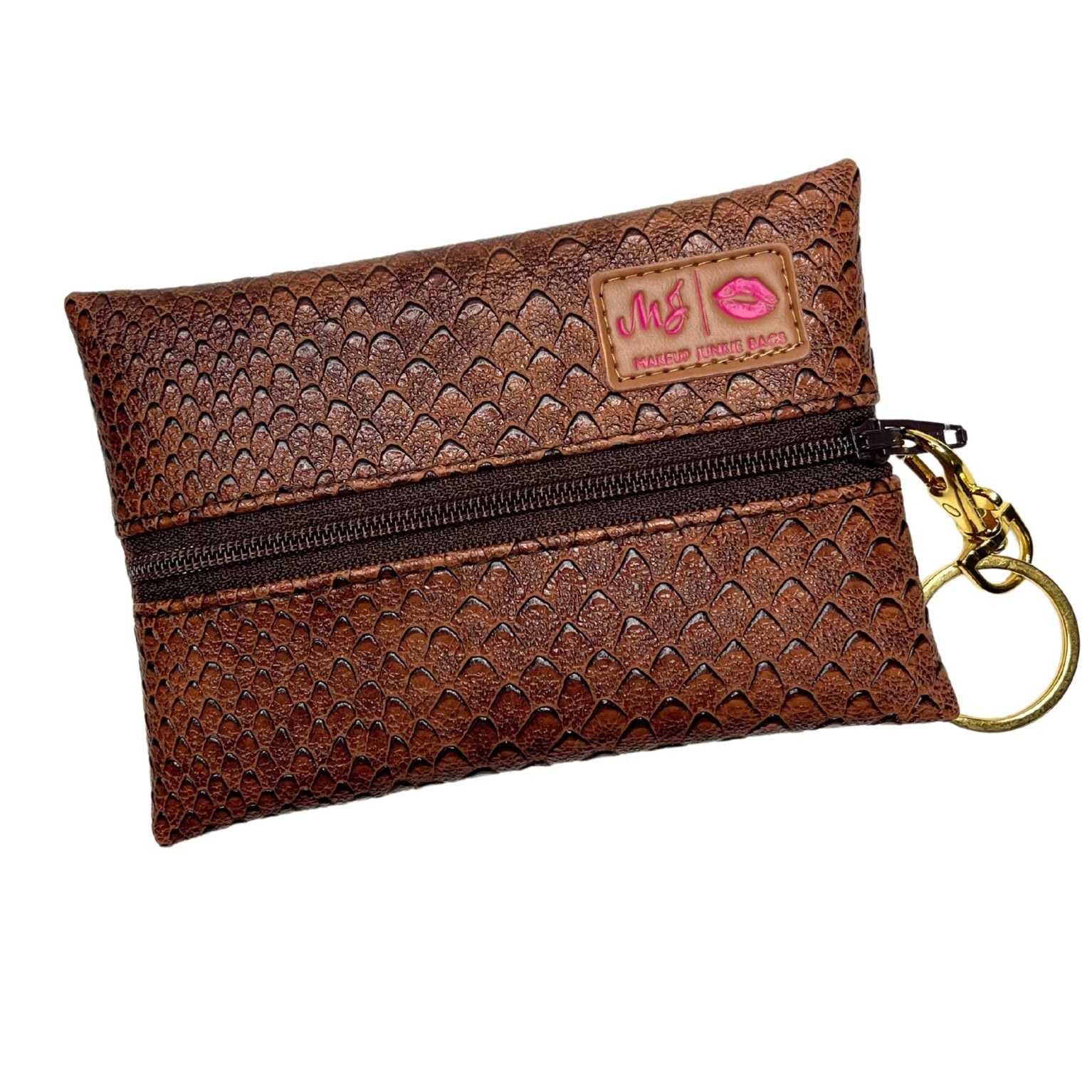 Brown textured pouch with zipper and keychain on a white background