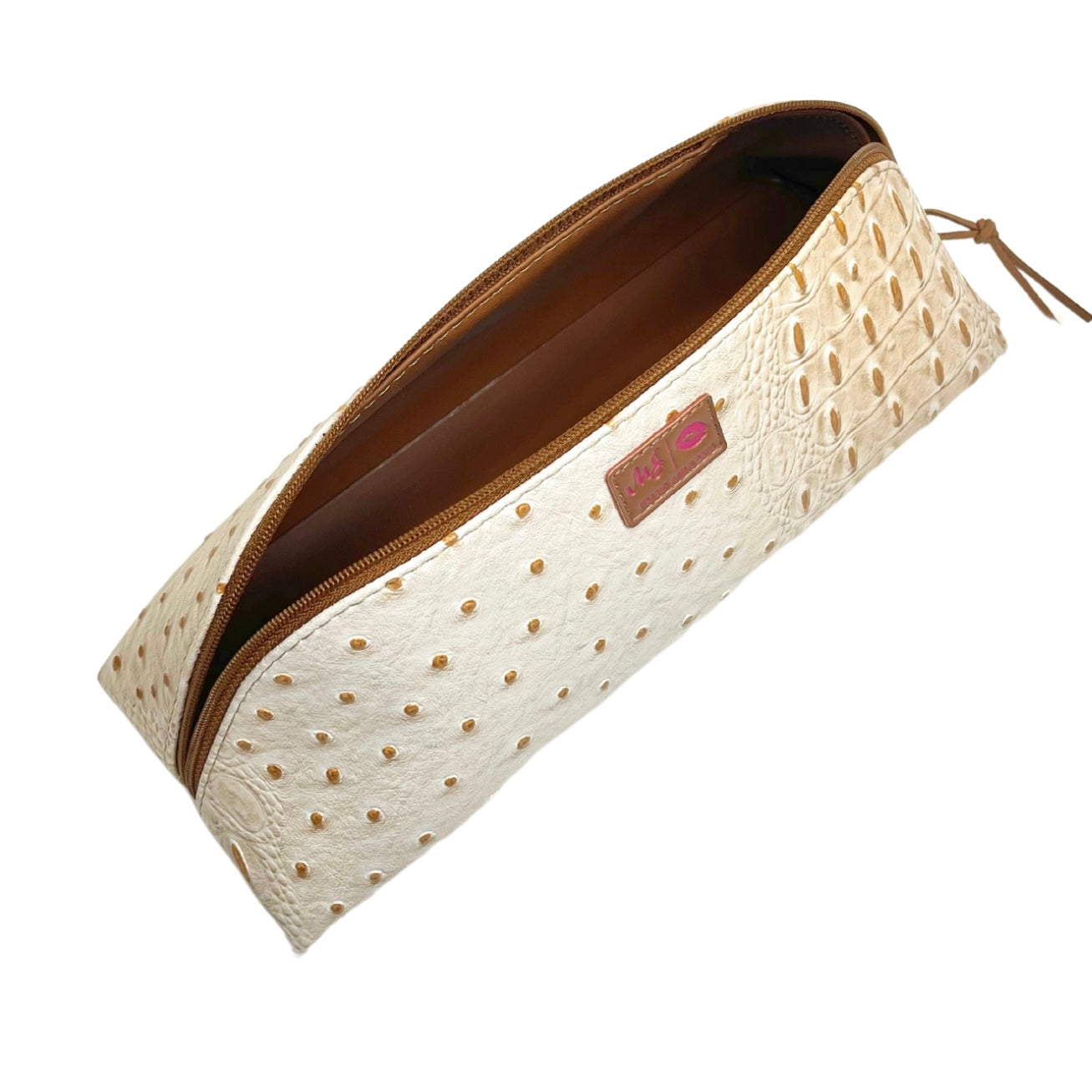 Beige pouch with gold polka dots and brown interior on a white background