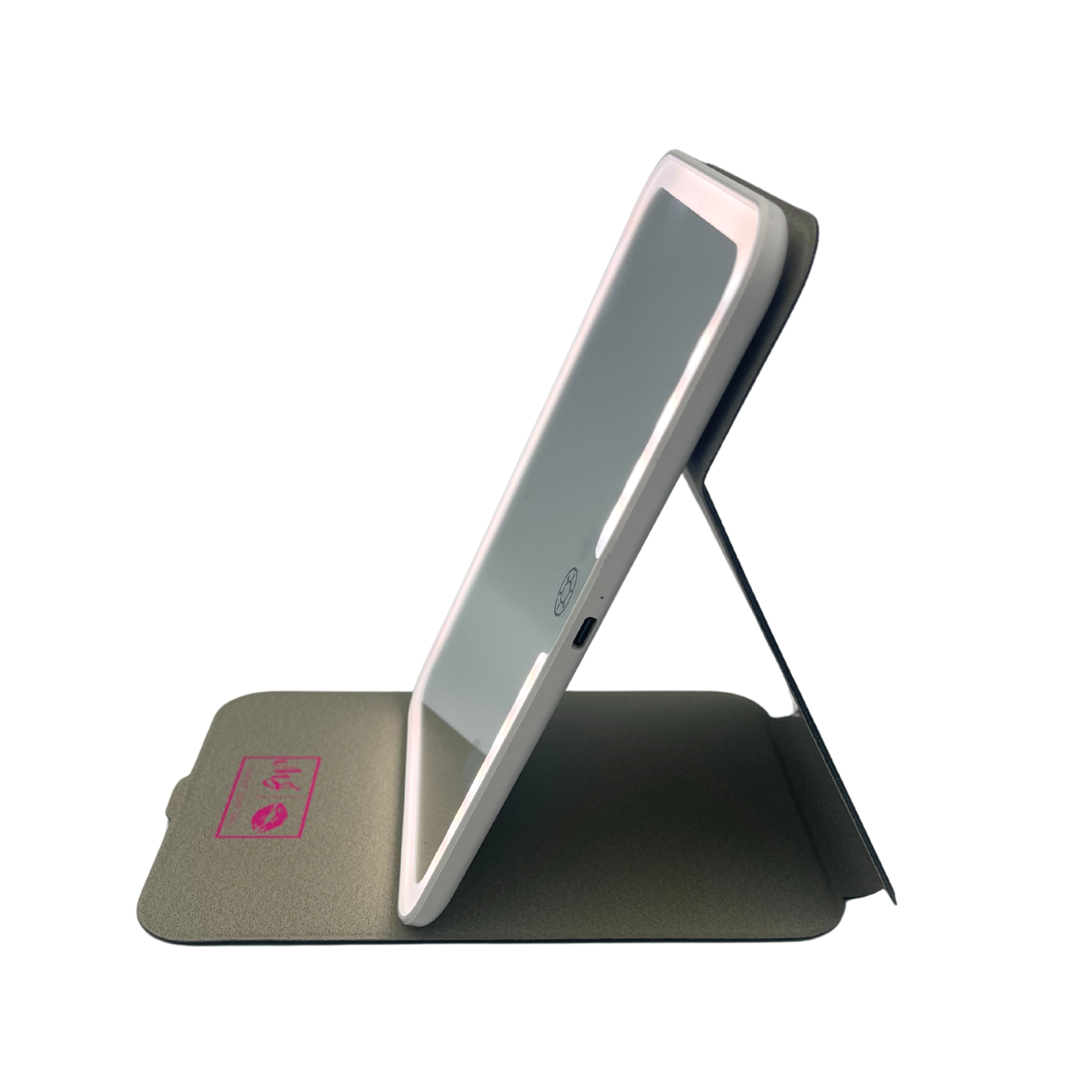 Tablet in a stand with a protective case on a white background