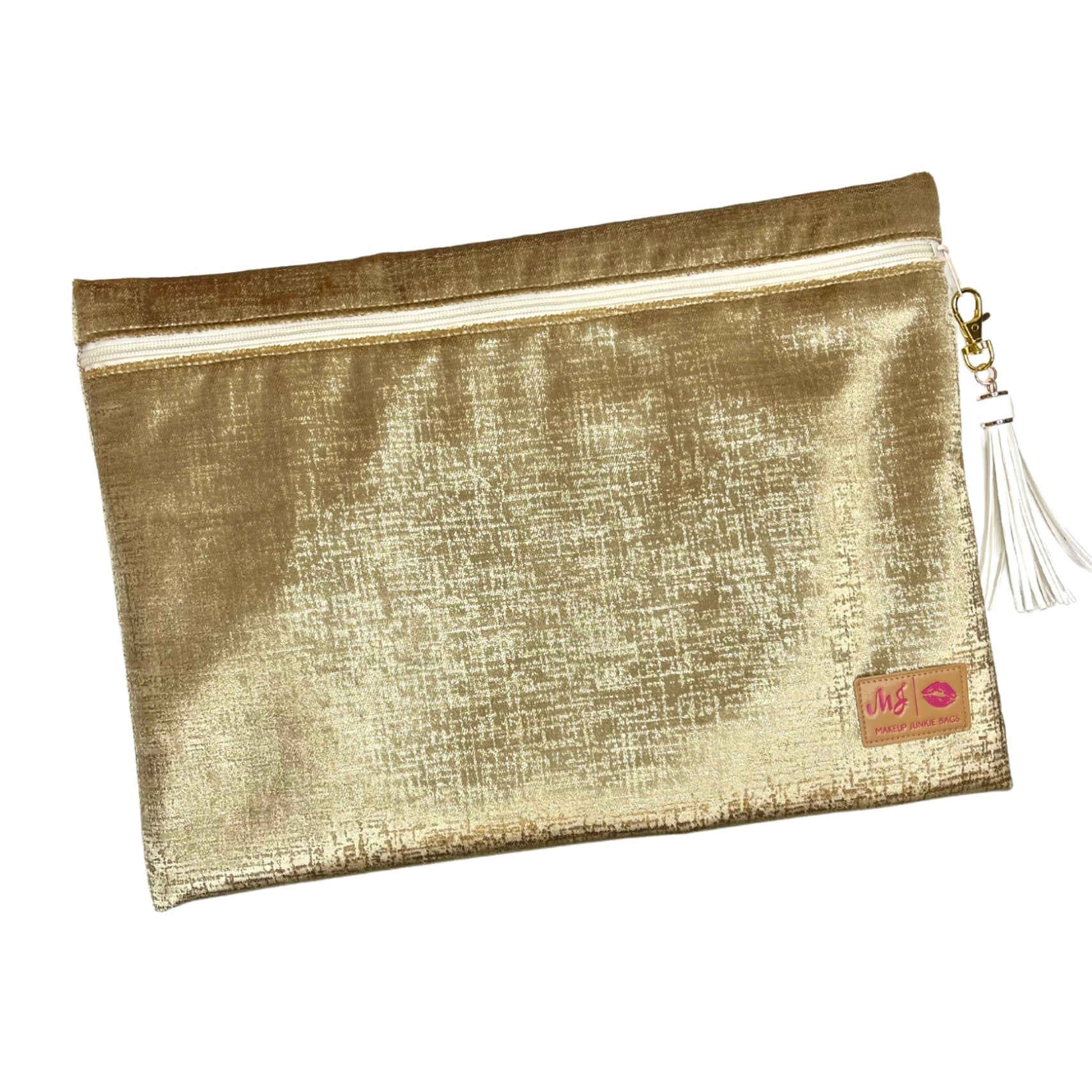 Gold pouch with a tassel on a white background