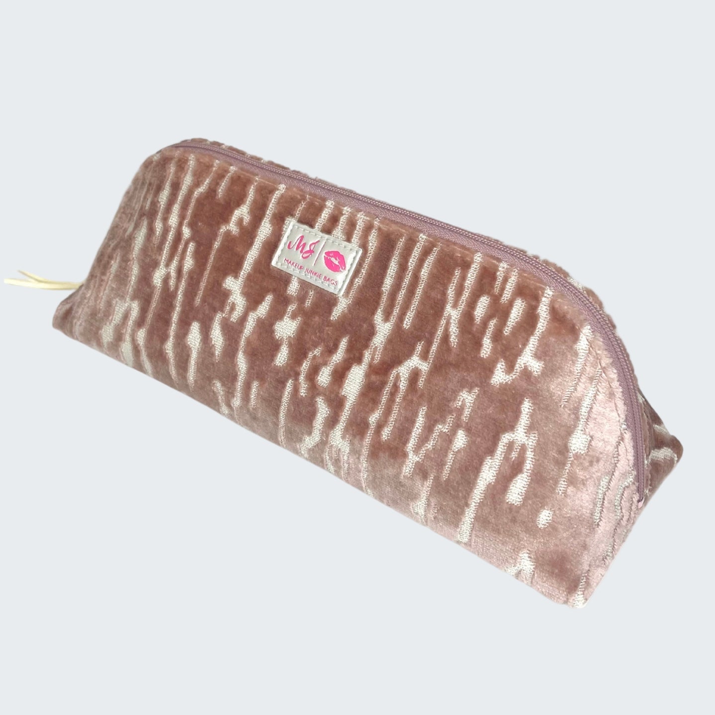 Pink and white patterned pouch with a visible brand logo on a white background