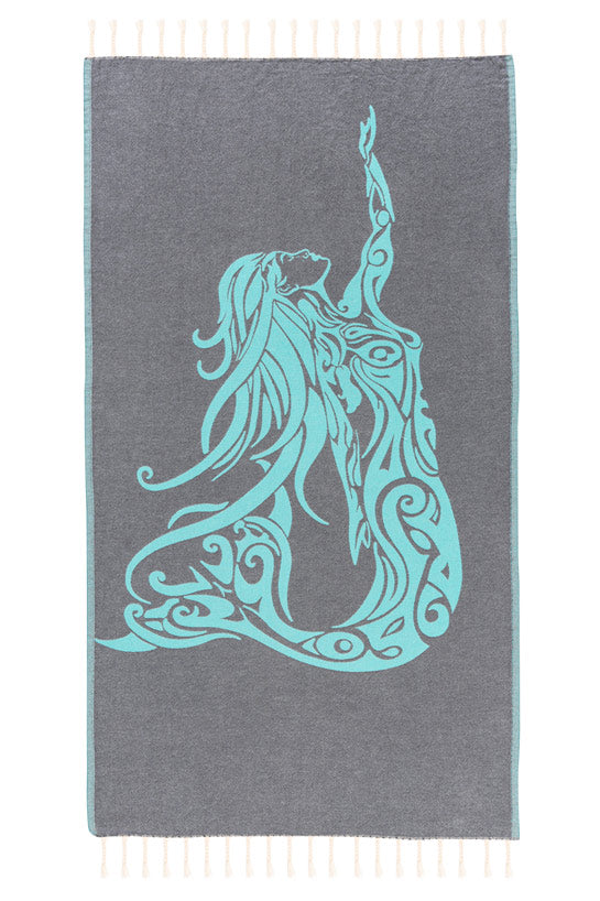Gray towel with a turquoise decorative letter 'Q' on a white background