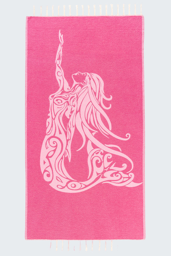 Pink towel with a white mermaid design on a white background