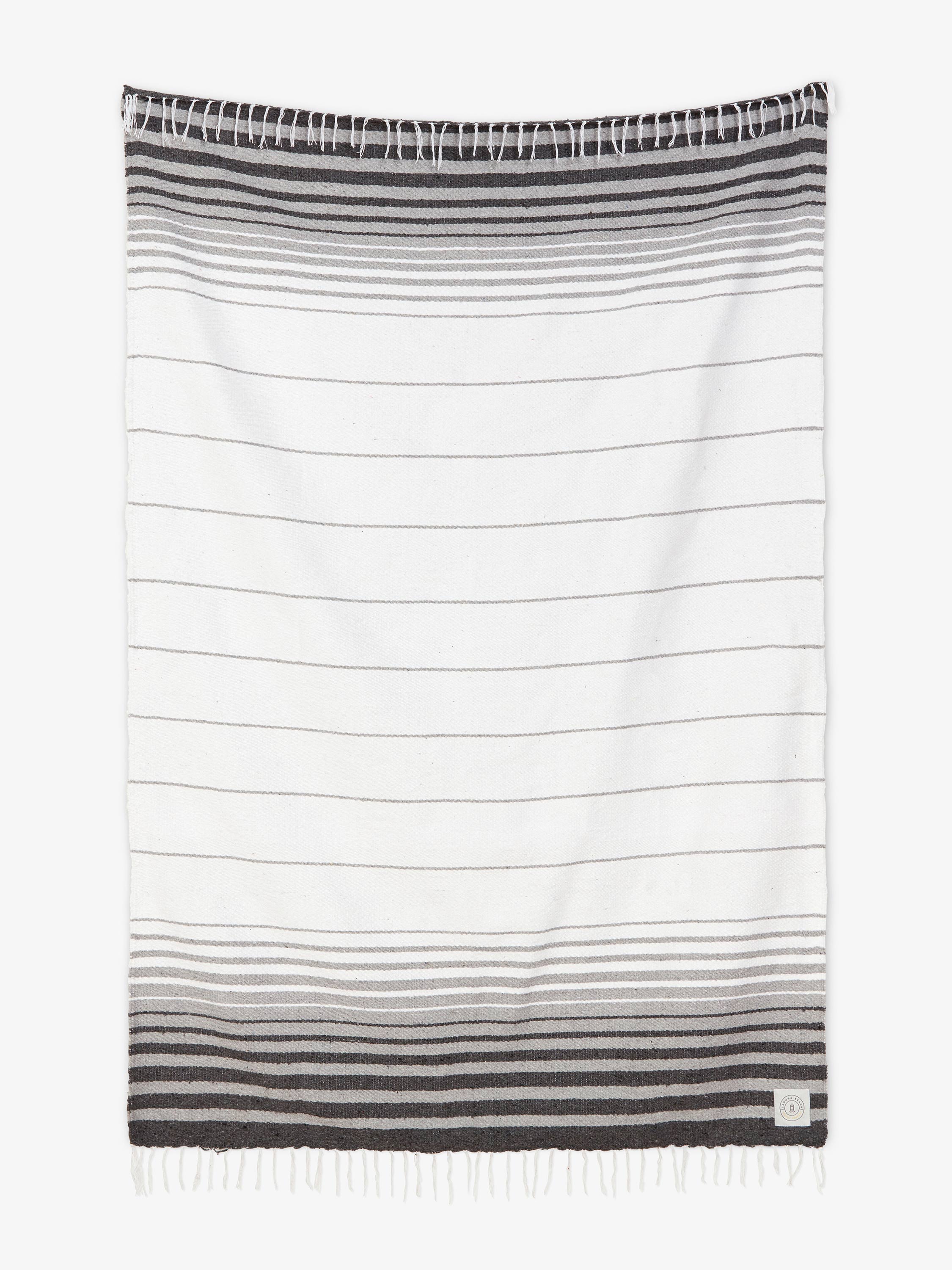 Striped towel with gradient design on a white background