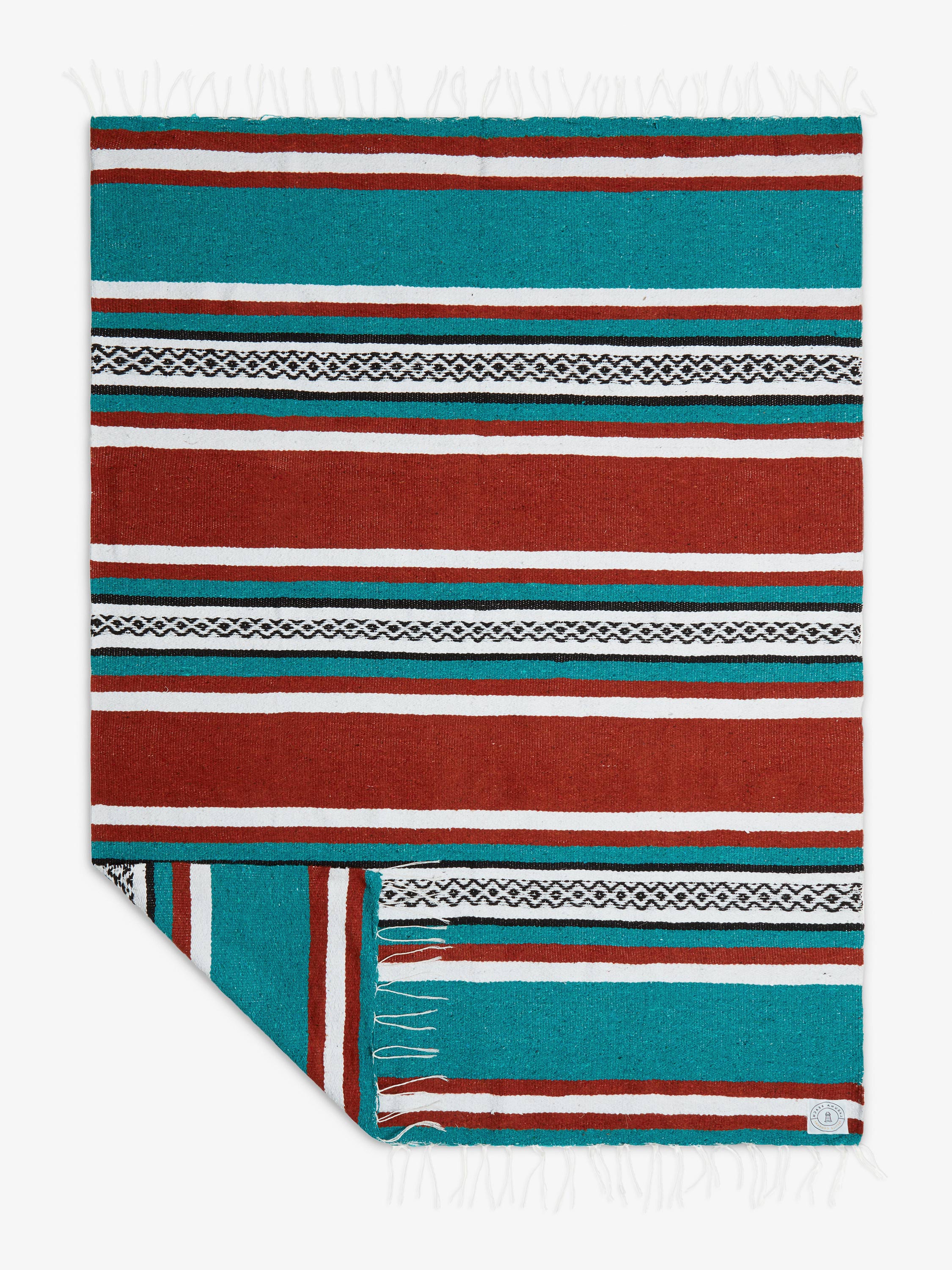Striped blanket with red, blue, and white colors on a white background