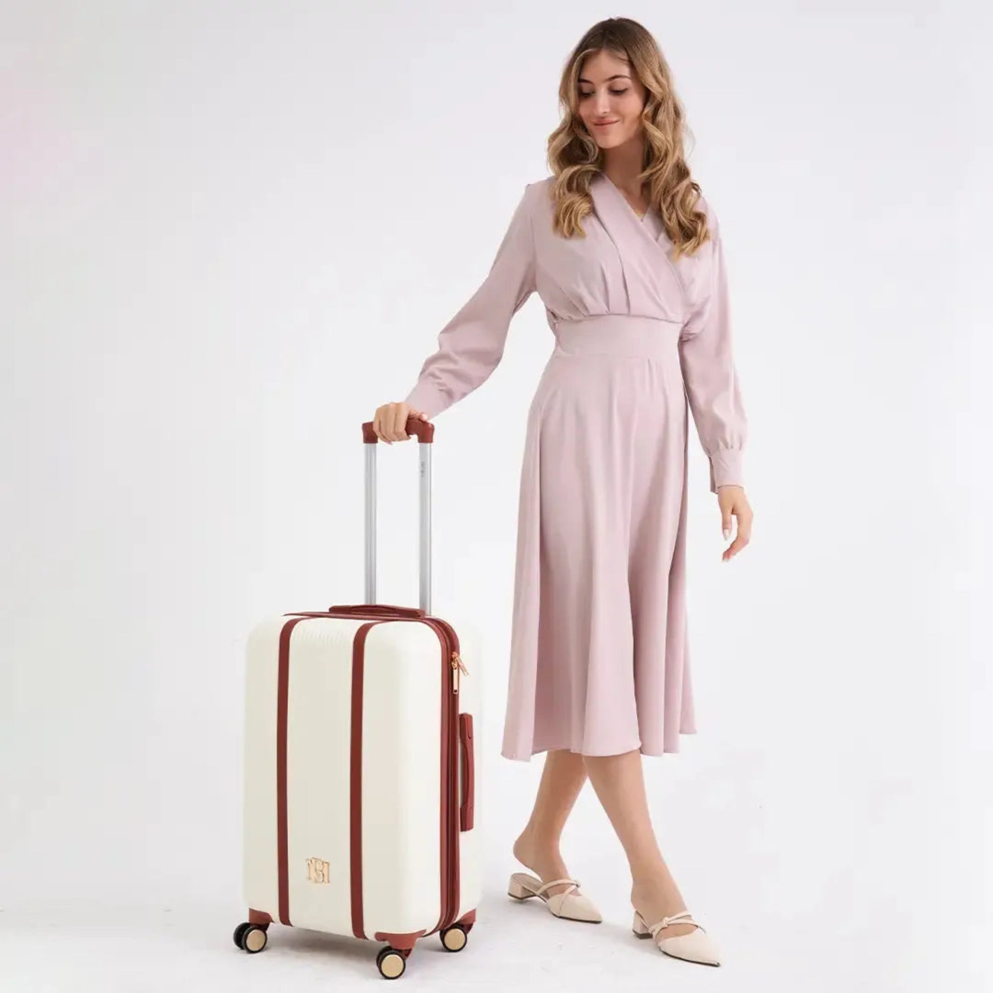 Woman in a light pink dress holding a white suitcase with red accents on a white background