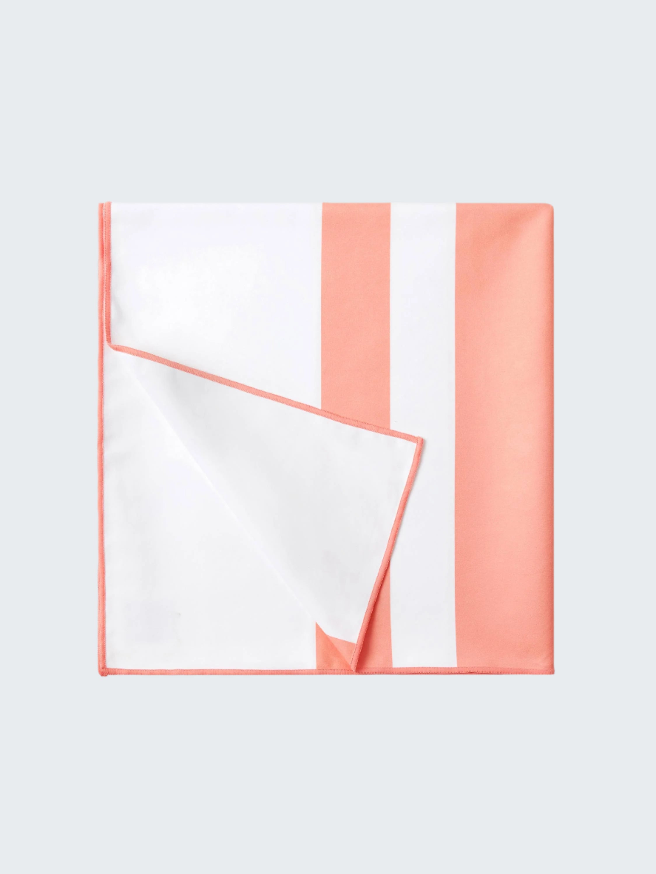 Coral and white striped fabric on a white background