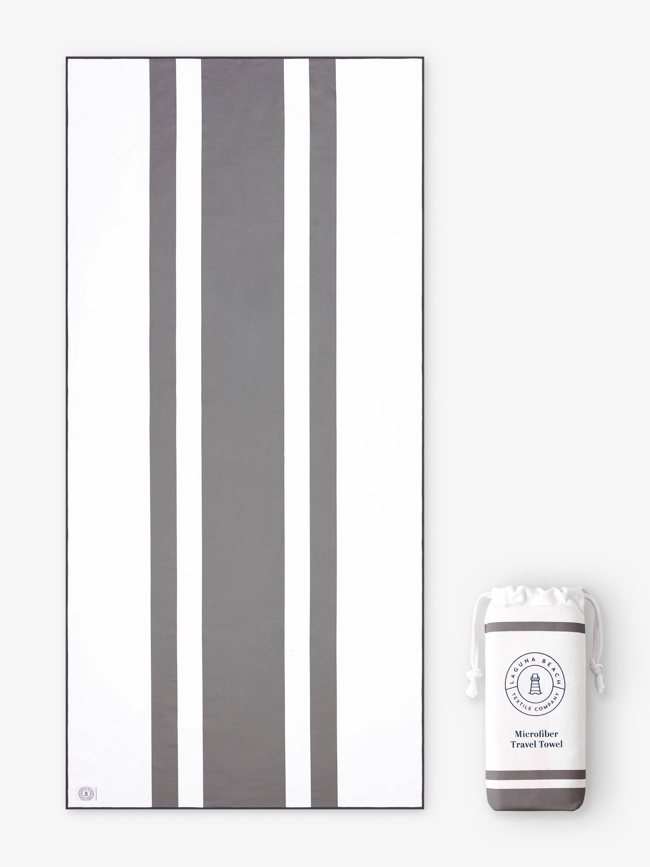Gray and white striped towel with a small container on a white background