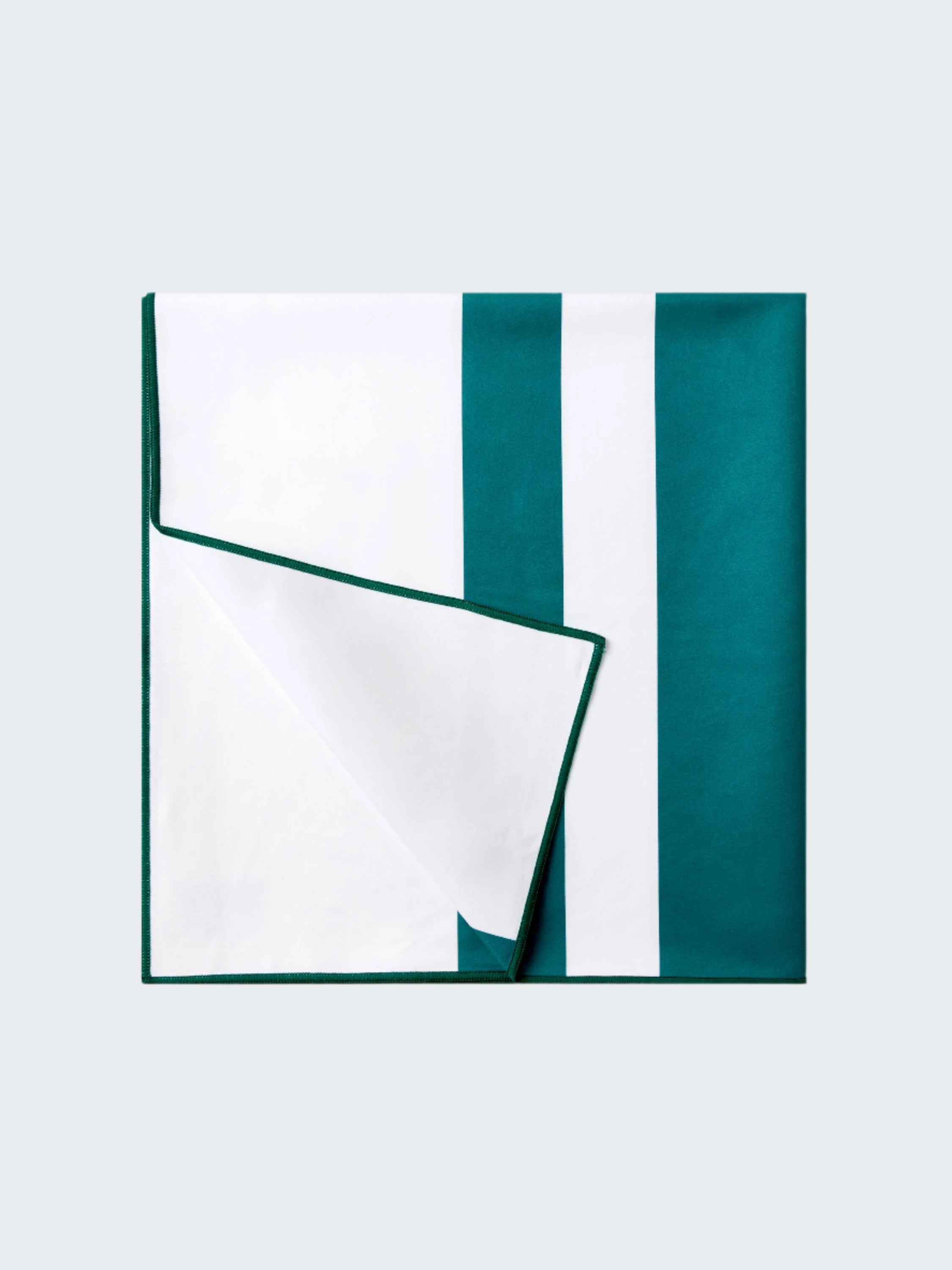 Teal and white striped fabric on a white background