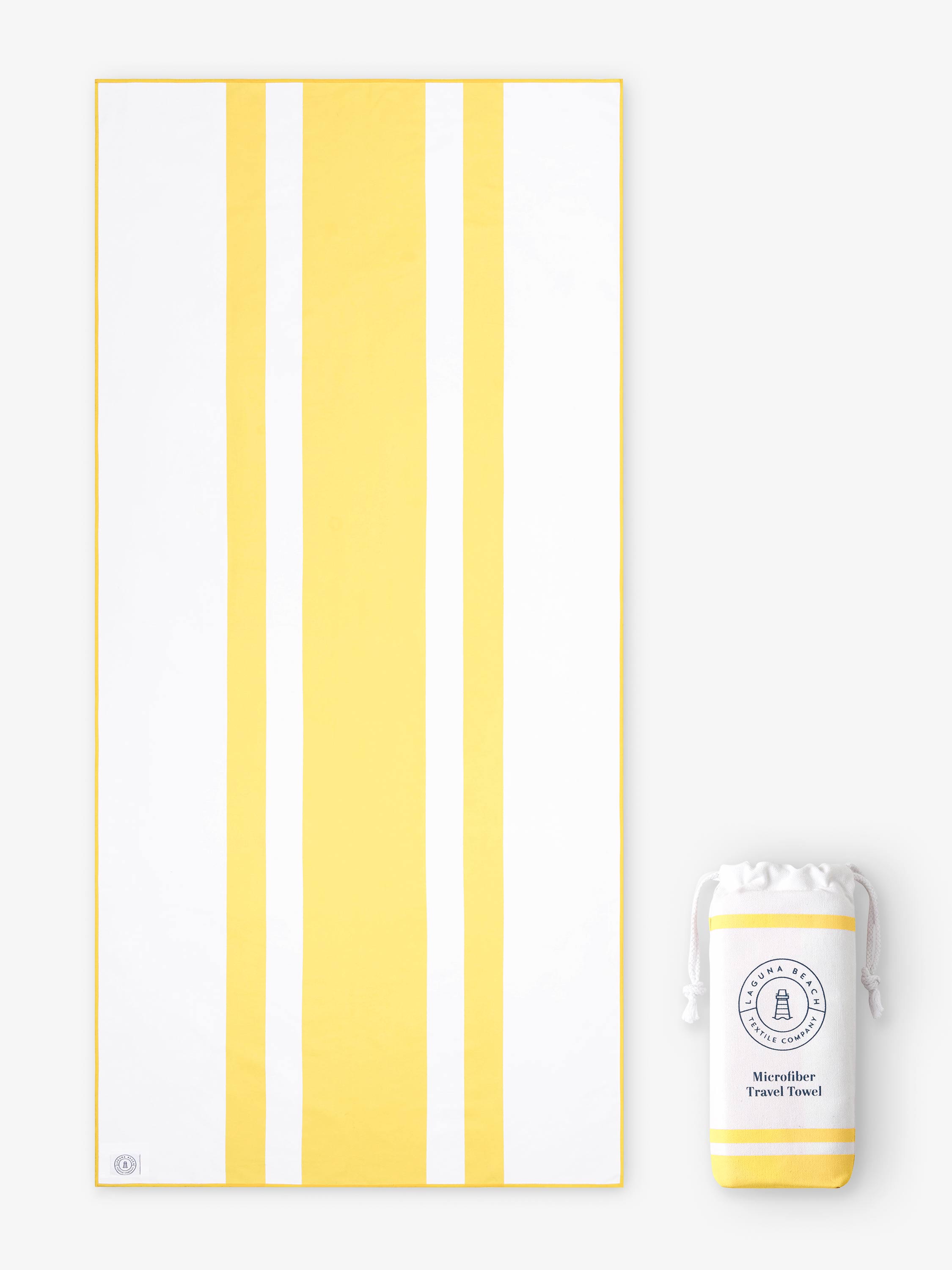 Yellow and white striped towel with a small white pouch on a white background