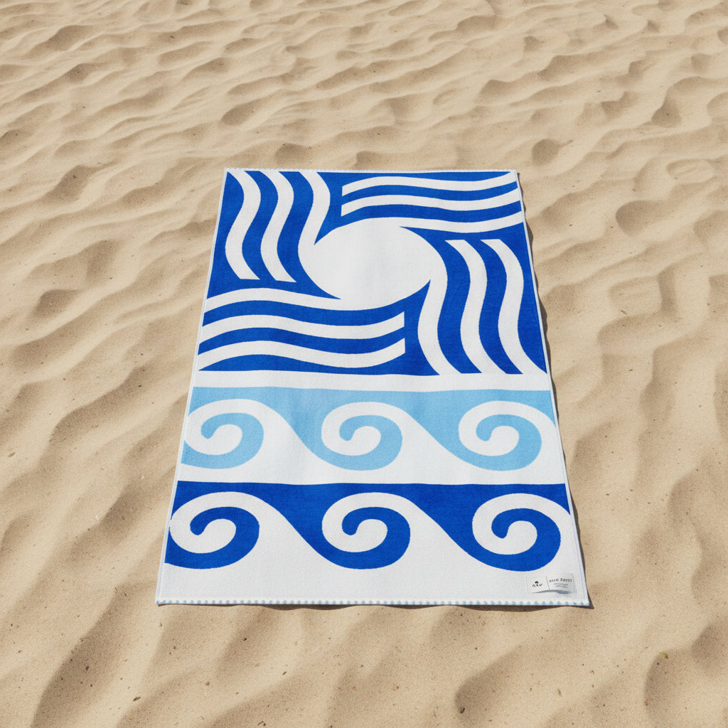 Towel with blue and white wave pattern on a white background