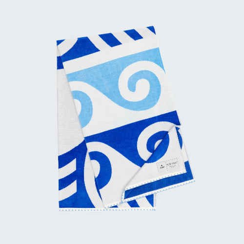 Blue and white patterned towel on a white background