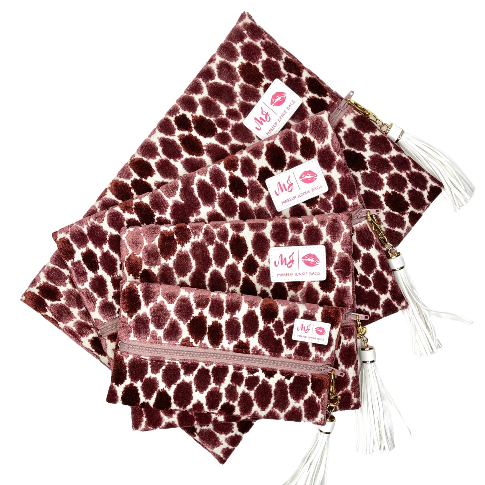 Set of red and white patterned pouches with visible brand labels on a white background