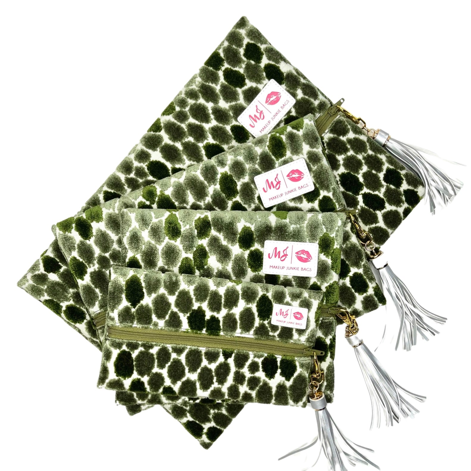 Green leopard print pouches with gold zippers and tassels on a white background