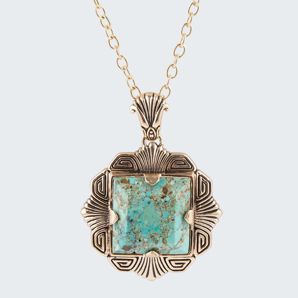 Turquoise pendant necklace on a white background