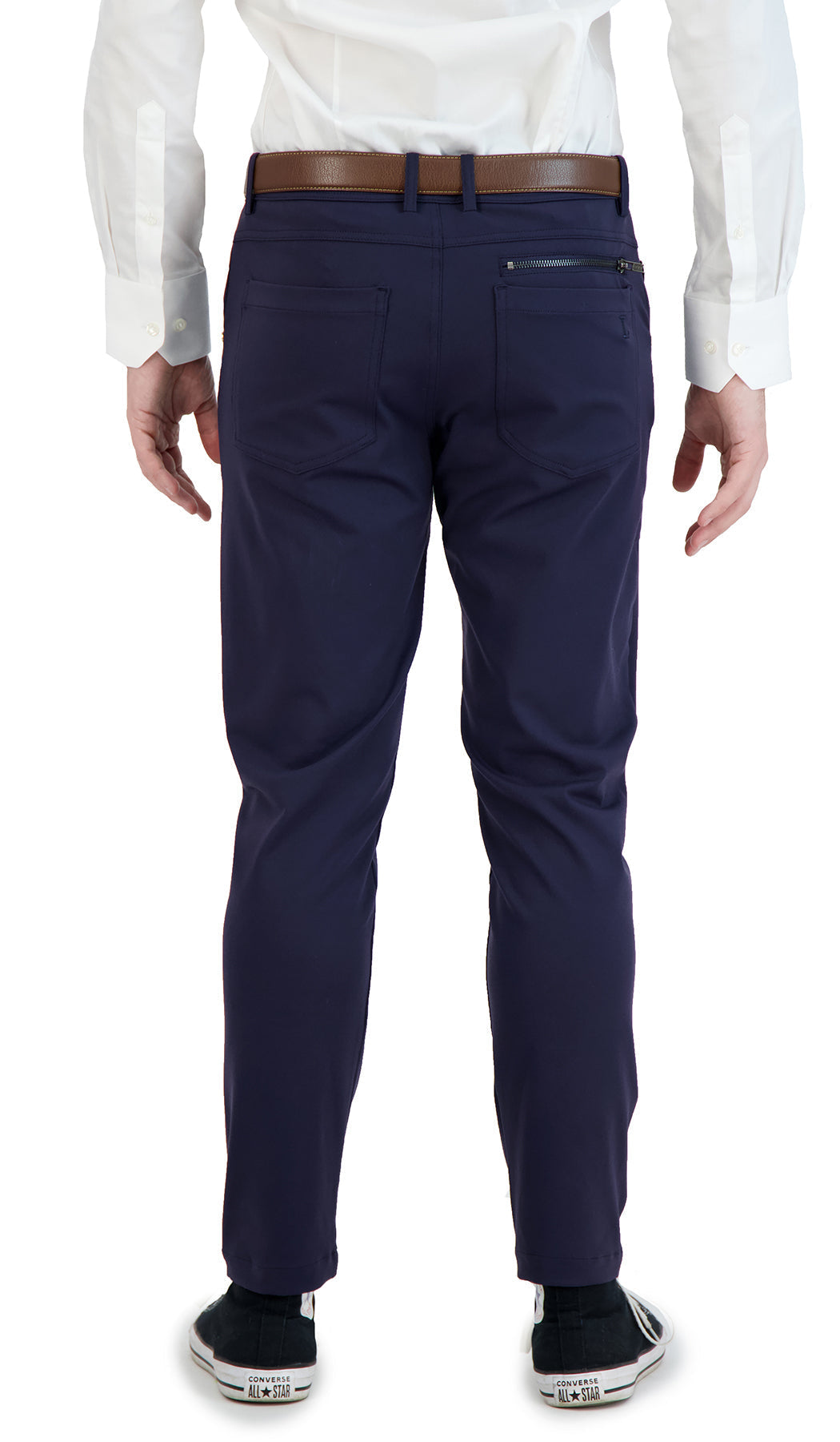 Navy pants worn by a person on a white background
