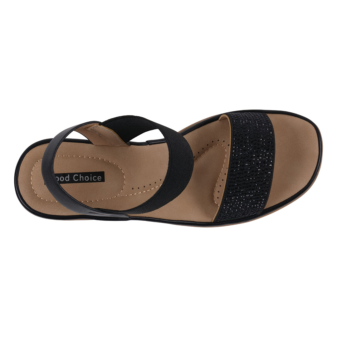 Black sandal with a strap on a white background