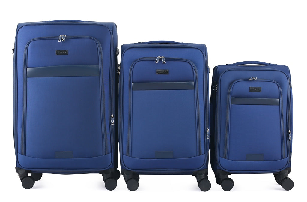 Three blue suitcases of different sizes on a white background