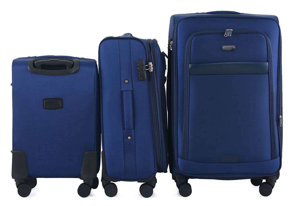 Three blue suitcases of different sizes on a white background