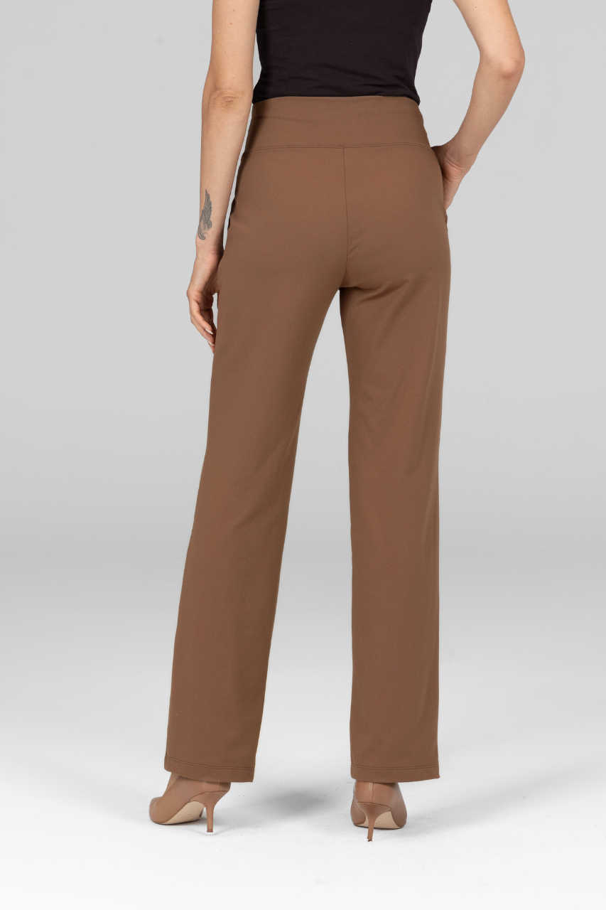 Brown pants worn by a person on a light gray background