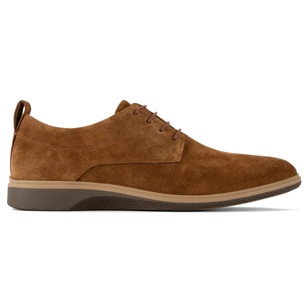 Brown suede shoe on a white background