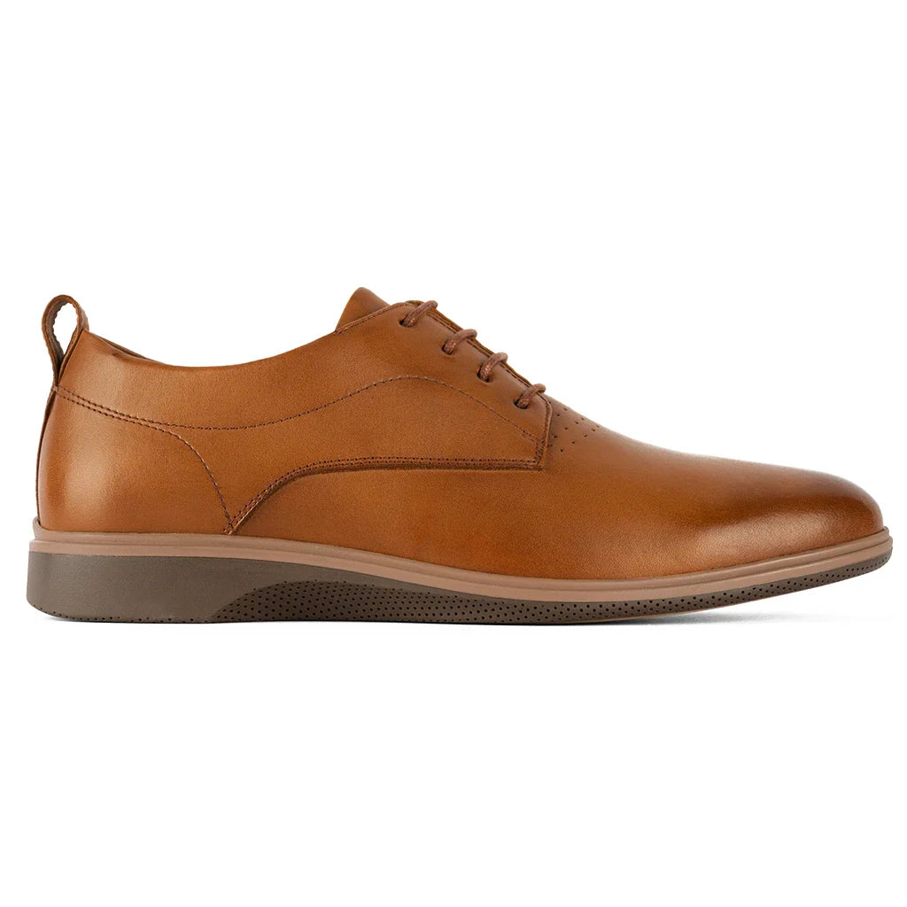 Brown leather dress shoe on a white background