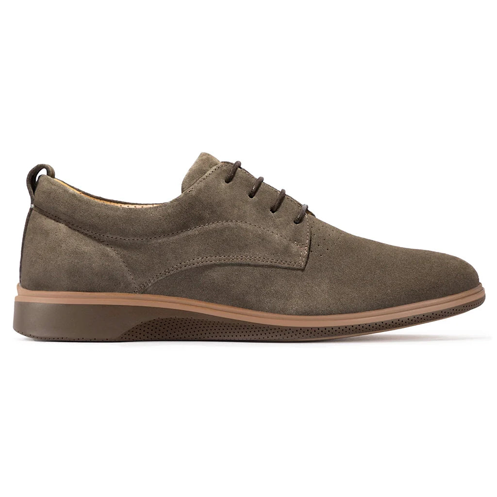Brown suede shoe on a white background