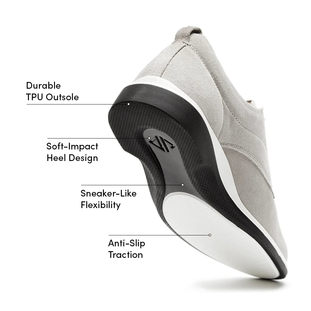 Gray shoe with labeled features on a white background