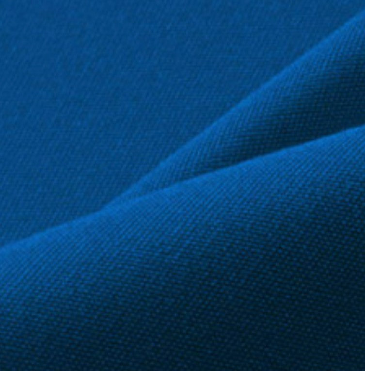 Close-up of blue fabric with a textured pattern