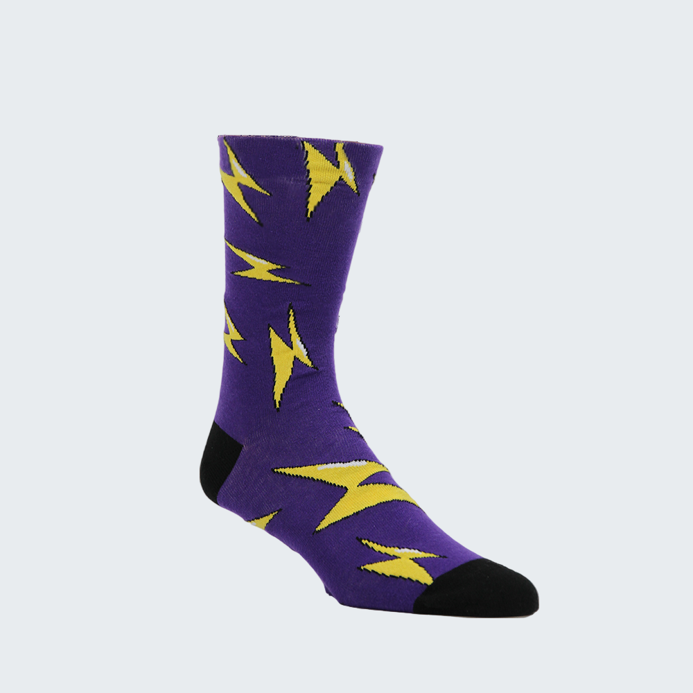 Purple sock with yellow lightning bolt patterns on a white background
