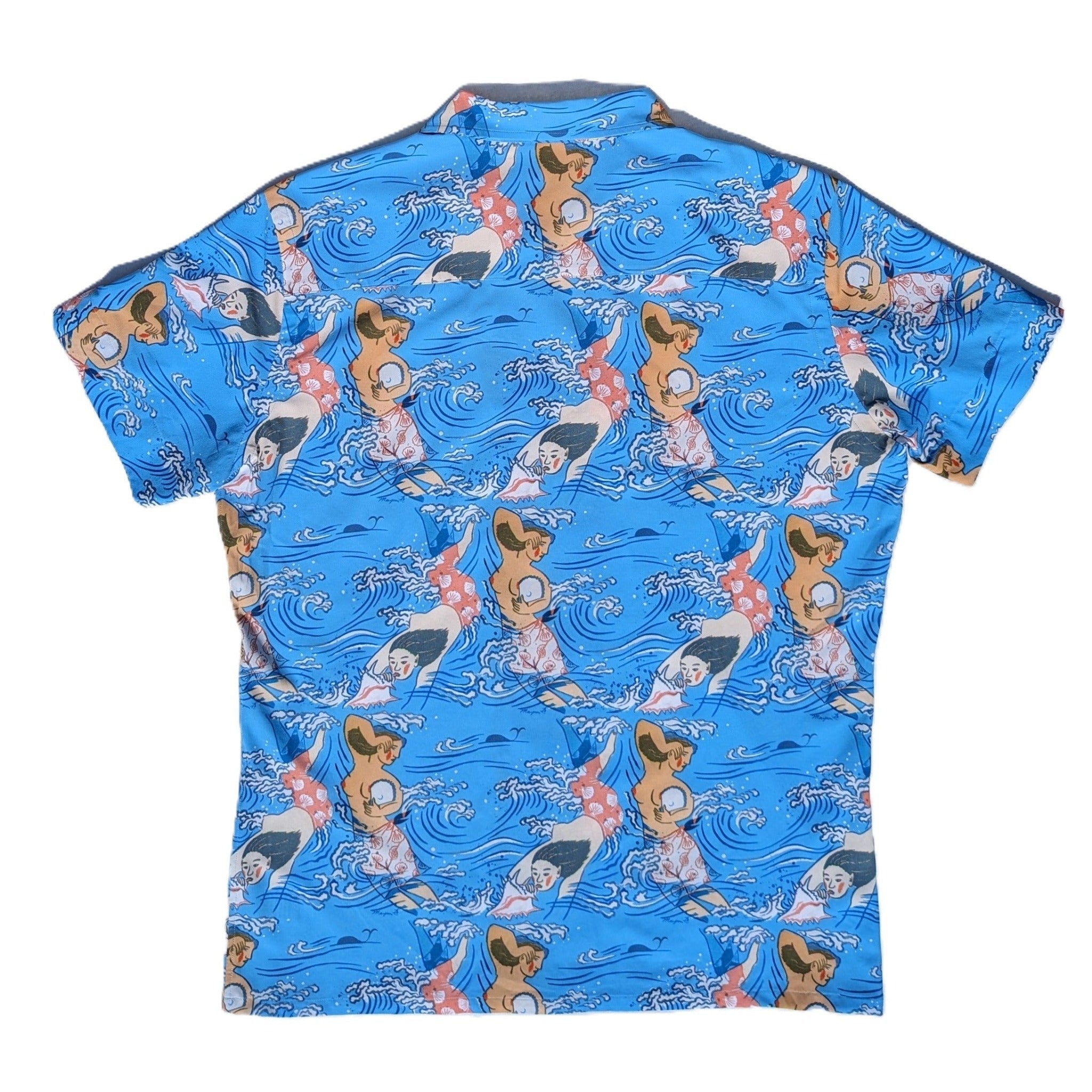 Blue shirt with mermaid and sea-themed pattern on a white background