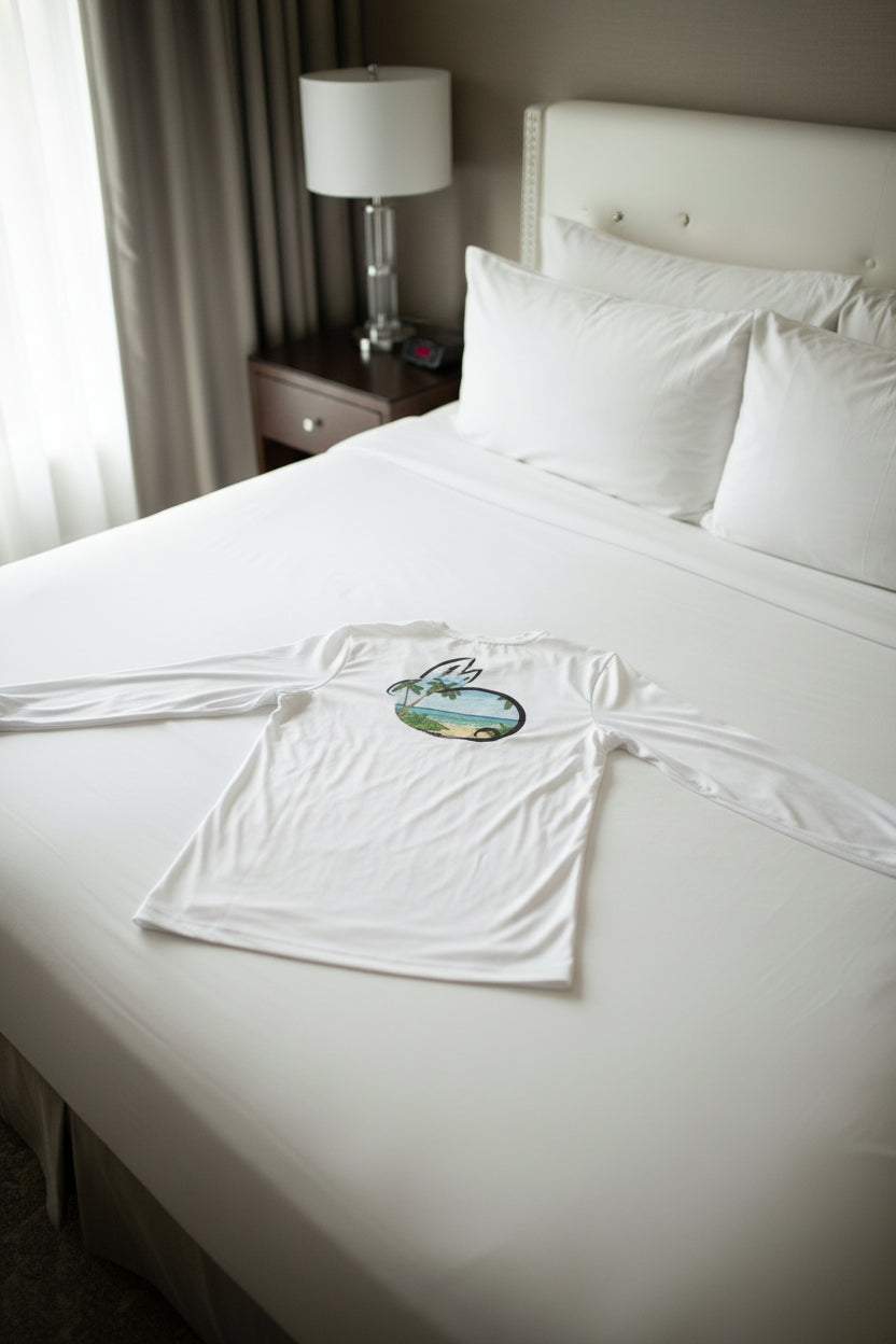 White long-sleeve shirt with a beach graphic on a white background