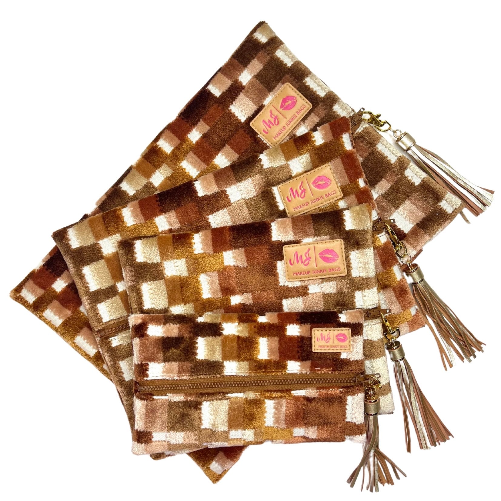 Set of plaid pouches with tassels and visible brand logo on a white background