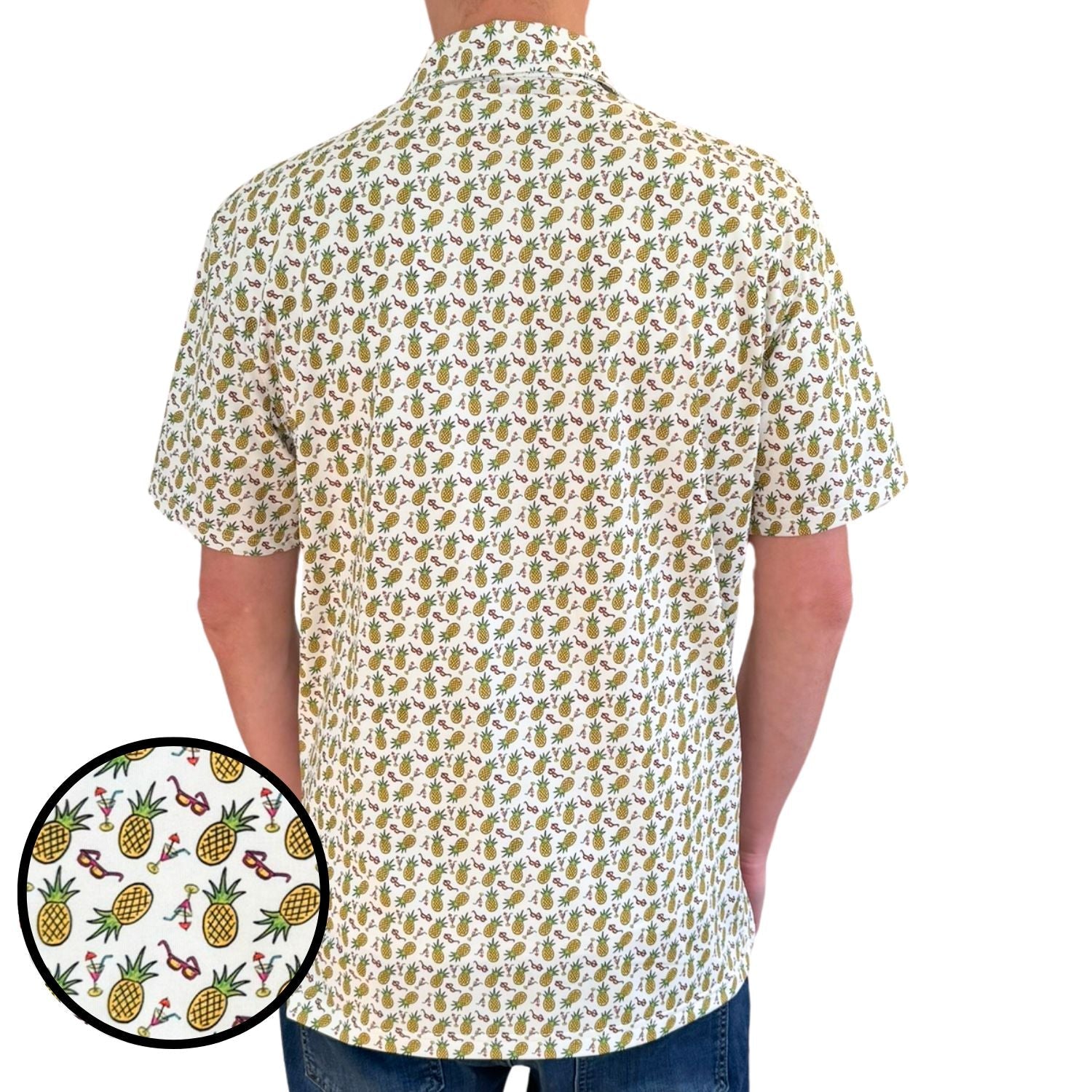 Person wearing a patterned shirt with a close-up of the pineapple design on a white background