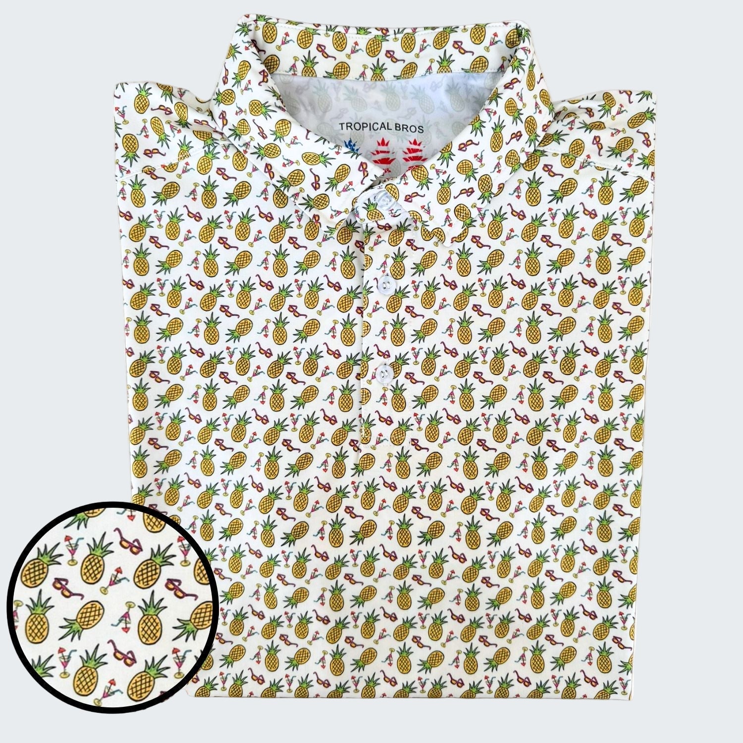 Polo shirt with pineapple pattern on a white background