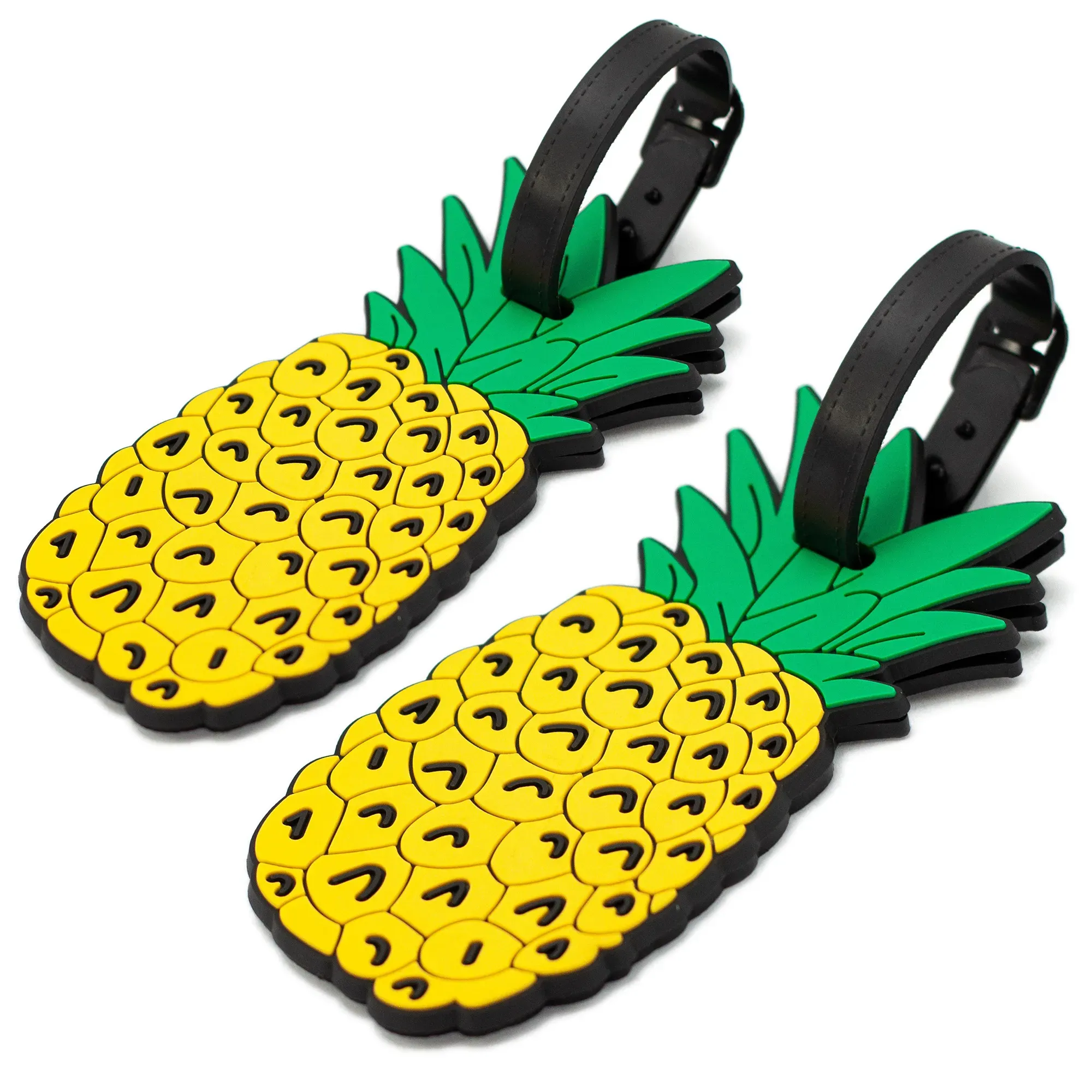 Two pineapple-shaped luggage tags with black straps on a white background